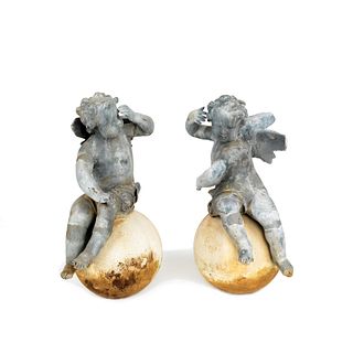Pair of lead putti garden ornaments, 35" h., toget