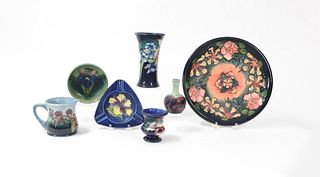 Seven pieces of Moorcroft pottery, 20th c., talles