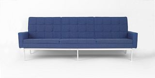 Pair of Knoll blue tufted sofas.