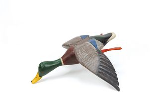 Carved mallard duck, 20th c., with spread wings.