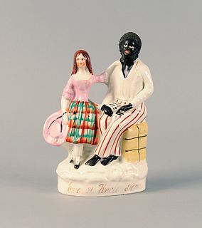 Staffordshire figure of Eva and Uncle Tom, 8 1/4".