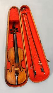 Maple violin with carved lion terminal and two pie