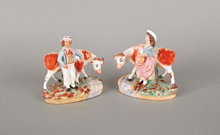 Two Staffordshire cow and figure groups, 6 1/4" h.