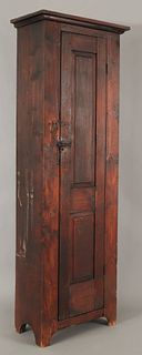 Stained pine chimney cupboard, 19th c., 85" h., 25