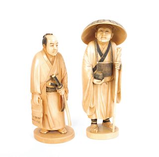 Two Japanese carved ivory figures of a samurai and