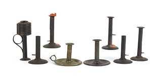 Five tin hogscraper candlesticks, 19th c., togethe