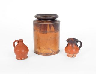 Redware crock, 19th c., 6 1/2" h., together with a
