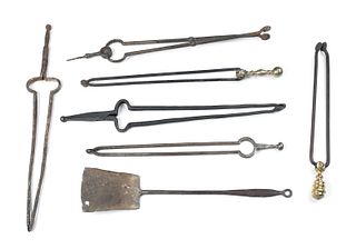 Six wrought iron fireplace tongs, 18th/19th c., to