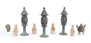 Three Chinese bronze lanterns, together with an in
