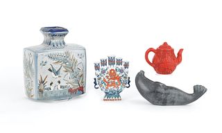 Mexican vase, together with an Eskimo carved seal,