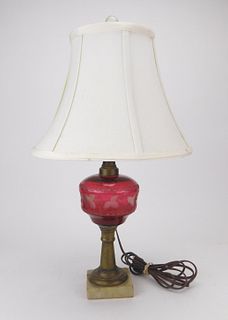 Brass and marble lamp with cranberry glass font
