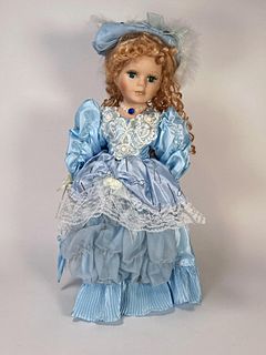 PORCELAIN DOLL IN BLUE GOWN