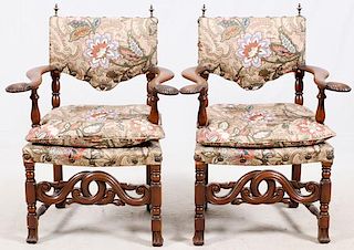 CARVED WALNUT UPHOLSTERED ARM CHAIRS PAIR