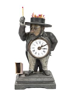 Figural table clock with automa