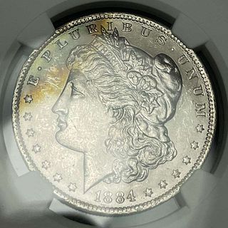 Toned 1884-O Morgan Silver Dollar NGC MS63