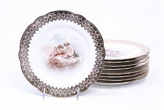 A Set of Nine French Porcelain Plates, Diameter 9 1/2 inches.