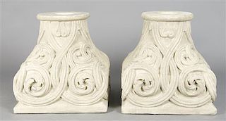 A Pair of Cast Stone Capitals, Height 20 1/2 inches.