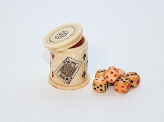 An Engraved Bone Dice Cup with Dice.