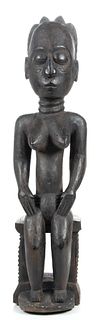 Baule, (Cote D'Ivoire) Carved Wood Sculpture, Seated Semi-Nude Female, H 27" W 6.5" Depth 8"