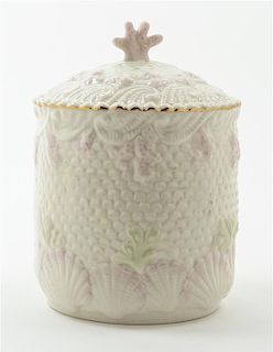 A Belleek Biscuit Jar, Height 7 1/2 inches.