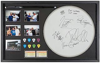 Def Leppard Autographed Concert Memorabilia Display.