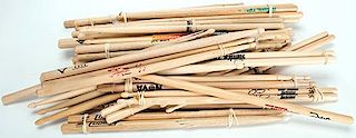 Collection of Tour-Issue Drumsticks of Various Rock Groups, Some Signed.