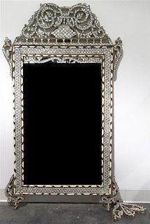 An Indian Bone and Mother-of-Pearl Inlaid Mirror, Height 56 x width 30 1/2 inches.
