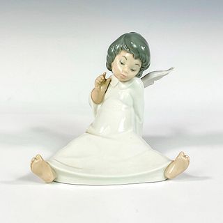 Cherub, Wondering 1004962 - Lladro Porcelain Figurine