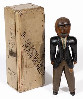 IMPORTANT CHARLES HENRY SAUNDERS (SHELBY, CLEVELAND CO., NORTH CAROLINA, 1901-1984) FOLK ART CARVED AND PAINTED FIGURE OF AN AFRICAN-AMERICAN MAN