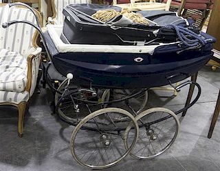 A Thayer Pram, Height 42 inches.