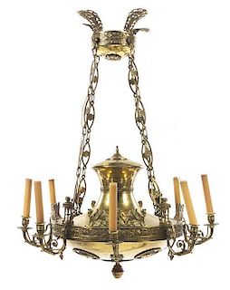 An Empire Brass Eight-Light Chandelier, Height 32 x diameter 23 inches.