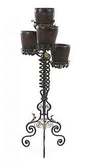A Parcel Gilt Iron Four-Part Jardiniere Stand, Height 54 inches.