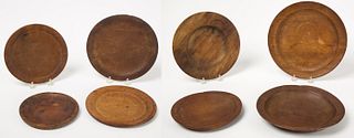 Eight Early Wooden Plates