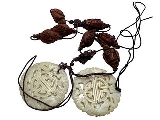 Two Jade Carved and Olive Carved Seeds