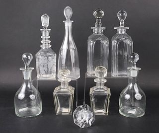 Eight Colorless Glass Decanters