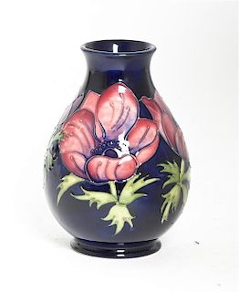 A Moorcroft Ceramic Vase, Height 7 1/4 inches.