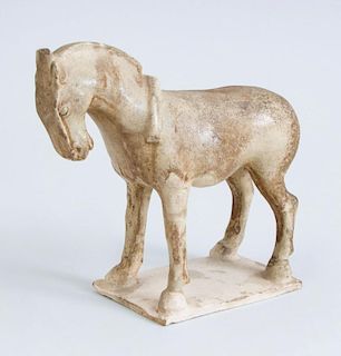 TANG PARTIAL STRAW-GLAZED POTTERY DIMINUTIVE FIGURE OF A HORSE