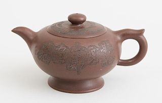 CHINESE ENGRAVED POTTERY TEAPOT