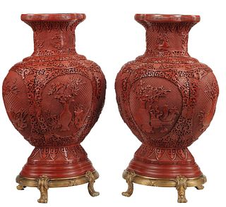 (2) CHINESE CINNABAR STYLE VASES ON BRONZE STANDS