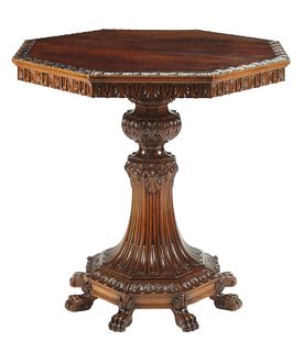 CARVED OCTAGONAL PEDESTAL TABLE ON PAW FEET