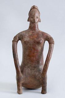 NAYARIT PROTOCLASSICAL POTTERY FIGURE OF A SEATED FEMALE