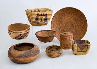 GROUP OF SEVEN NATIVE AMERICAN WOVEN BASKETS AND A HAT