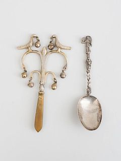 CONTINENTAL SILVERED METAL RATTLE AND SILVER SPOON