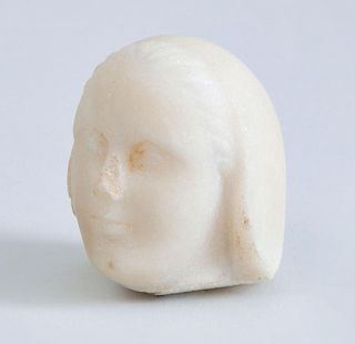 CONTINENTAL CARVED MARBLE HEAD OF A FEMALE