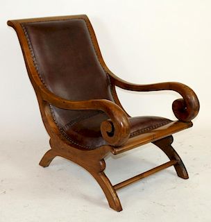 Mahogany sling back leather armchair