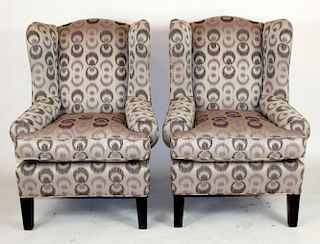 Pair of wingback upholstered armchairs