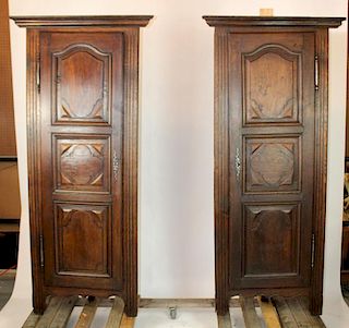Pair French oak barrel back corner cabinets