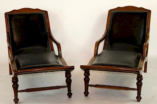Pair of mahogany and leather chaise longue
