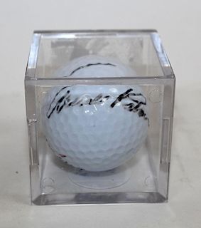 Signed Arnold Palmer golfball in case