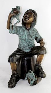 Bronze fountain of boy with frogs